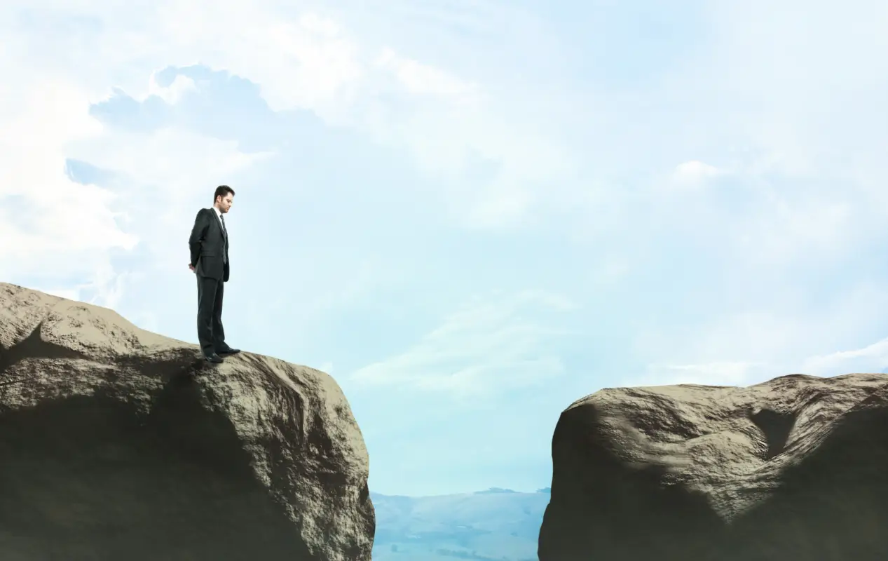 insurance gap - man standing at a gap in the path